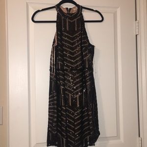 Nude and black sequin dress